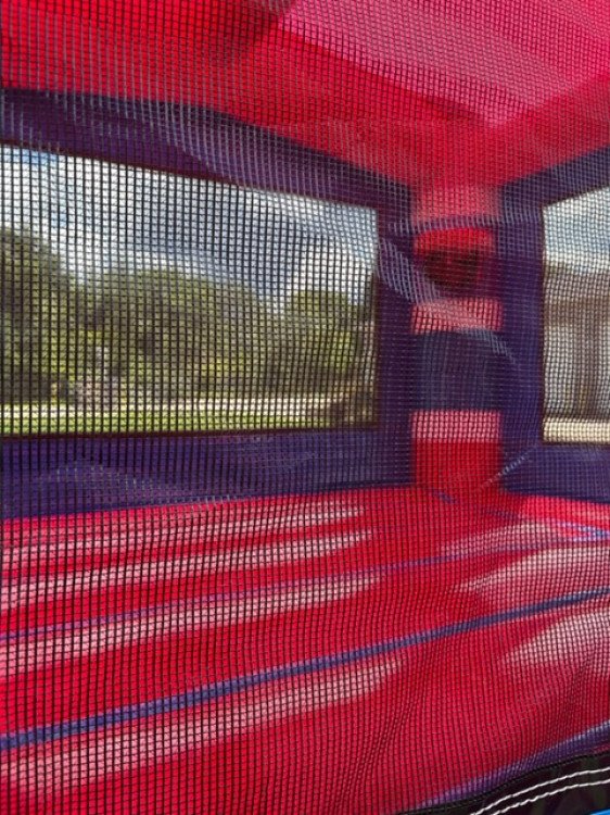 inside of a bounce house with red interior