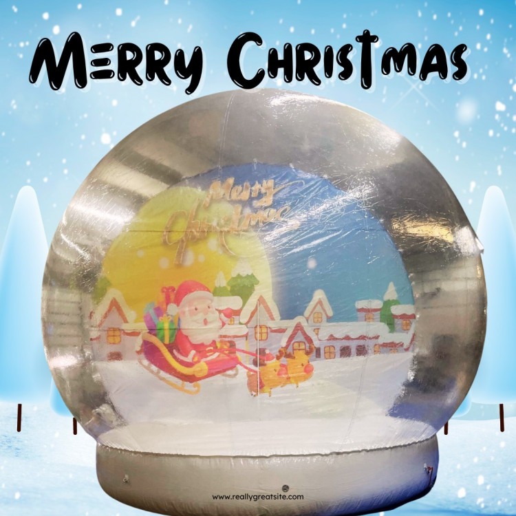 Christmas themed human snow globe in Norton, OH. - Game Craze Party & Event Rentals